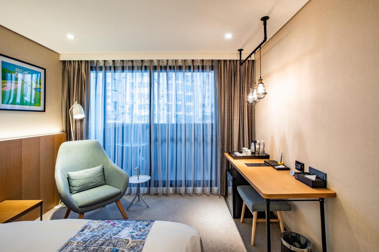 Mega Hotel Csiaji Kültér fotó